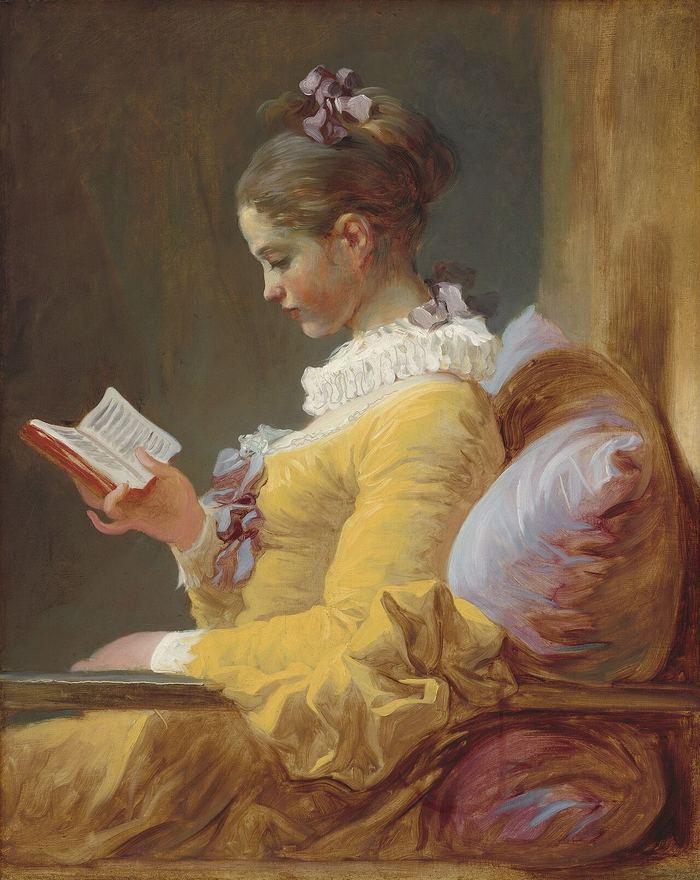 Oil portrait of a young woman in a yellow dress reading a book